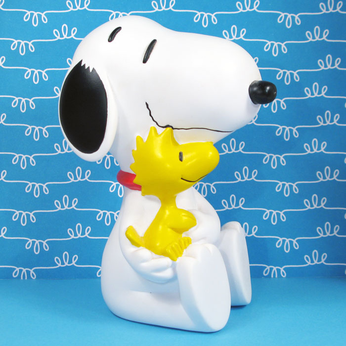 Snoopy holding Woodstock Bank - ShopCollectPeanuts.com