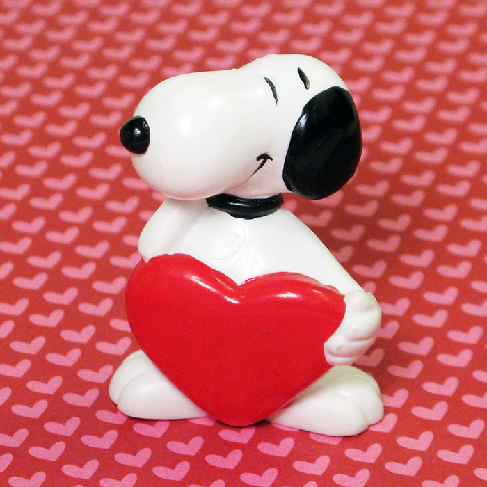 Snoopy holding heart PVC Figurine